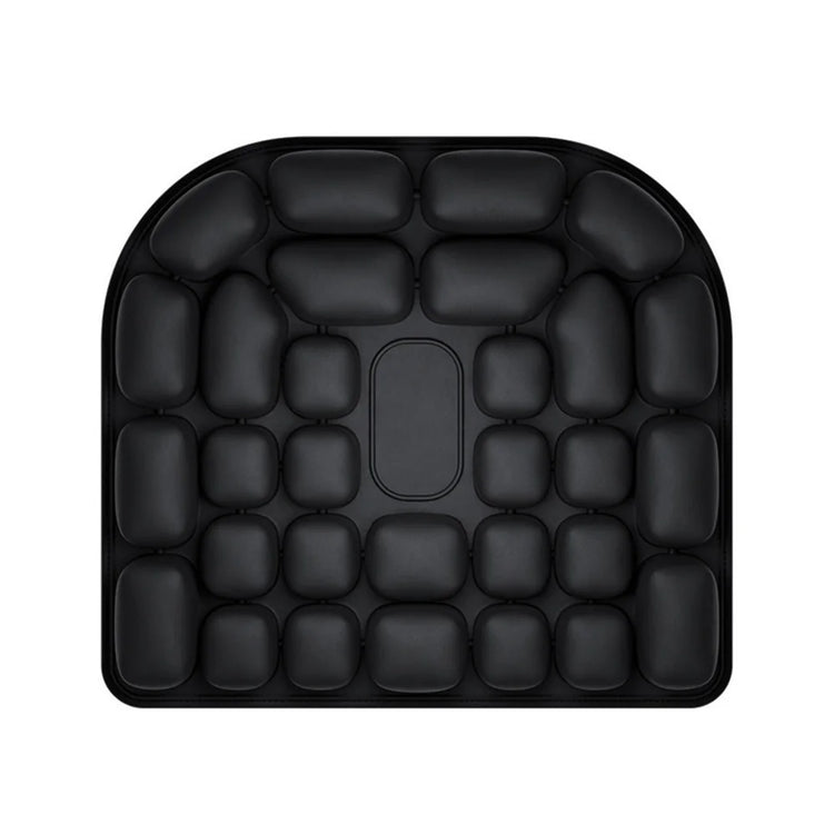 Top view of the black inflatable seat cushion with raised air cells and a central recessed panel.